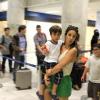 Ivete Sangalo embarca com o filho, Marcelo, no aeroporto Santos Dumont, no Rio de Janeiro, em 12 de maio de 2013