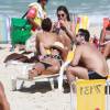Adriane Galisteu curtiu a praia da Barra da Tijuca, na Zona Oeste do Rio, neste domingo, 16 de agosto de 2015. A artista estava acompanhada por seu marido, Alexandre Iódice