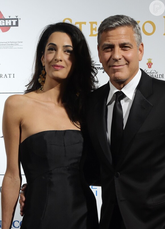 George Clooney e Amal Alamuddin esperam o primeiro filho