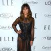 Lea Michele deixou as pernas à mostra durante a festa da revista americana 'ELLE' ao apostar em um vestido todo transparente