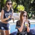 Na novela 'Totalmente Demais', Cassandra (Juliana Paiva) avisou Eliza (Marina Ruy Barbosa) para não beber nada oferecido por Sofia (Priscila Steinman)