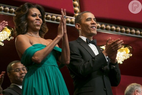 Barack Obama ao lado da mulher, Michelle Obama