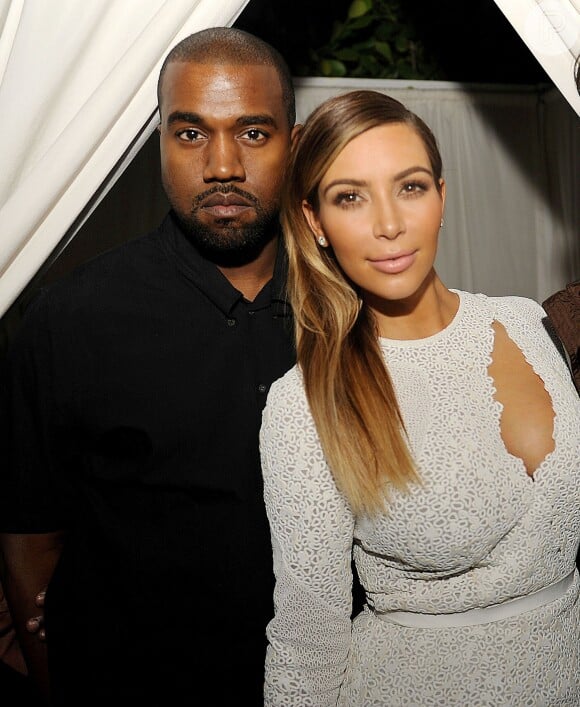 Kanye West dá um soco em rapaz que xingou Kim Kardashian, em 14 de janeiro de 2013