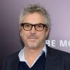 O cineasta mexicano Alfonso Cuarón também marcou presença na premiére do filme 'Caçadores de obras-primas'