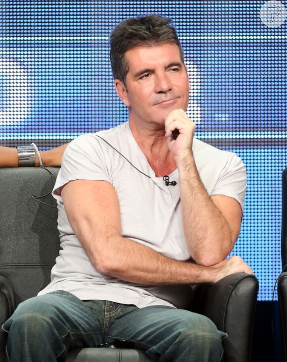 Simon Cowell falou pela primeira vez sobre a gravidez durante a coletiva de imprensa de apresentação da nova temporada do 'The X Factor', em agosto de 2013. 'Infelizmente, quero ter privacidade neste momento, mas muito obrigado de qualquer forma', disse