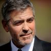 Clooney é flagrado após se encontrar com o presidente Obama na Casa Branca em dezembro de 2012