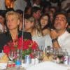 Xuxa e o namorado durante evento.