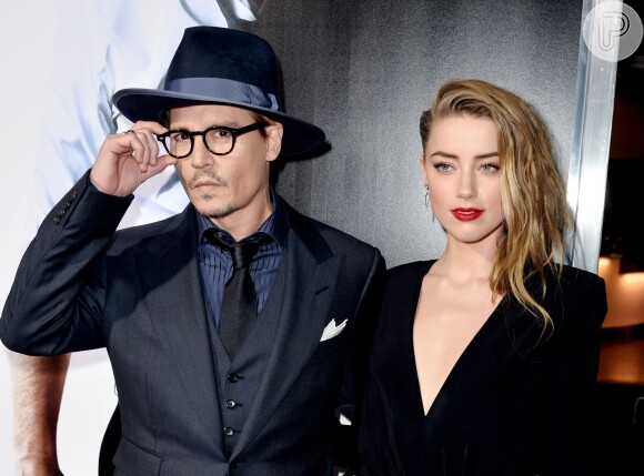 Johnny Depp e Amber Heard fizeram uma festa de noivado, em Los Angeles, na Califórnia, em 14 de março de 2014