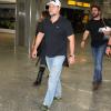 Russell Crowe desembarca no aeroporto internacional do Rio, em 19 de março de 2014