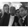 Kanye West e Kim Kardashian entre os amigos Rosie Huntington e Oliver Rousteing