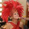 Xuxa posa sorridente com fantasia vermelha de Carnaval em foto divulgada pela marca Wella em 5 de fevereiro de 2013