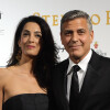 US actor-director George Clooney arrives with his fiancee, British-Lebanese human rights lawyer Amal Alamuddin for the Celebrity Fight Night at the Palazzo Vecchio in Florence, Italy, September 7, 2014. The charity event benefits the Andrea Bocelli Foundation and the Muhammad Ali Parkinson Center. Photo by Eric Vandeville/ABACAPRESS.COM08/09/2014 - Florence