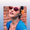 Debora Nascimento postou fotos suas com looks azuis