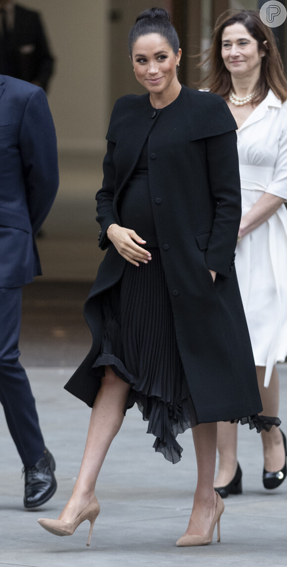 No fim de janeiro, Megha Markle voltou a brilhar com um look Givenchy na gravidez