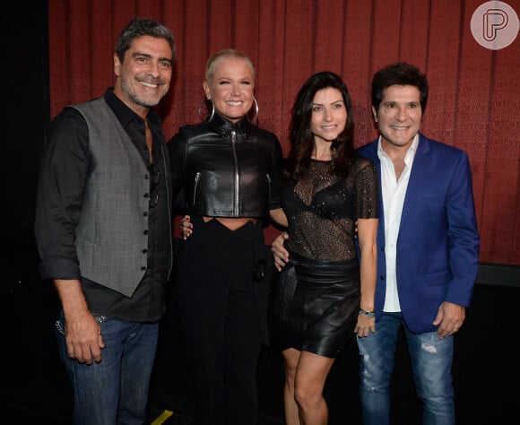 Xuxa foi acompanhada do namorado, Junno Andrade, à pré-estreia do documento 'Daniel - 30 Anos de Estrada' e se encontrou com o sertanejo e a mulher, Aline de Pádua