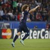 O jogador David Luiz comemora gol em partida do Paris Saint-Germain contra o Barcelona