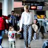 Luana Piovani embarcou nesta sexta-feira, 3 de outubro de 2014, no aeroporto Santos Dumont, na Zona Sul do Rio de Janeiro. A atriz estava acompanhada pelo filho, Dom, e pela babá do menino
