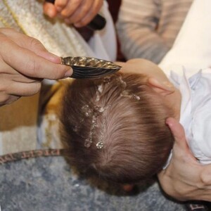 O momento do batismo de Rael