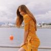 Para almoçar em Cannes, durante o Festival de Cinema, Marina Ruy Barbosa apostou em um look solar com vestido amarelo estampado