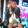 A cantora Kesha se apresentou no Ano Novo da Times Square de 2010 para 2011 com as músicas 'TiK Tok' e 'We R Who We R'