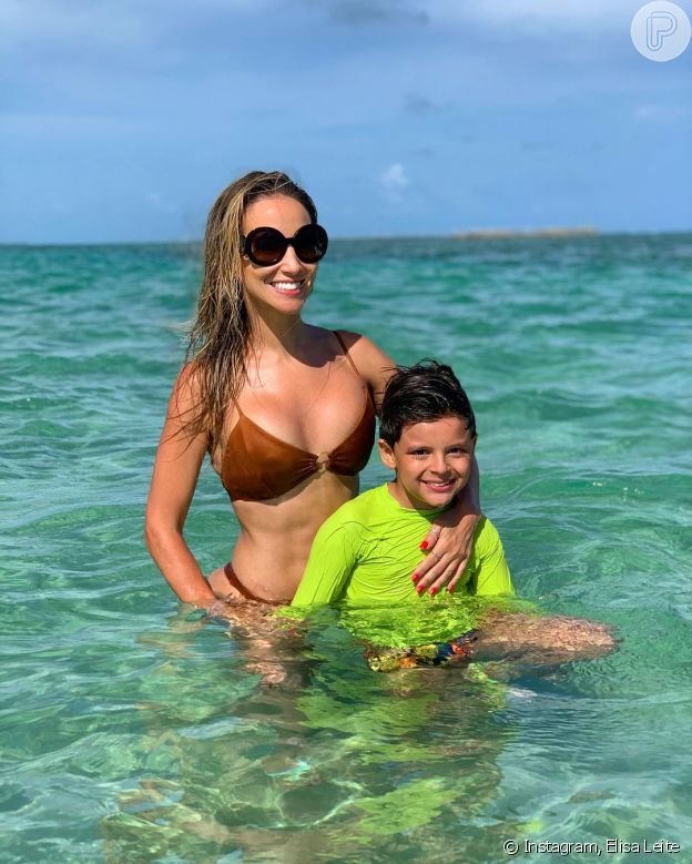 Filho mais novo de Cristiano Araújo é comparado a cantor em foto com mãe