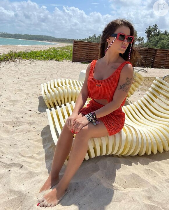 Andressa Suita é fã de moda praia grifada: a modelo já usou conjunto laranja da Prada