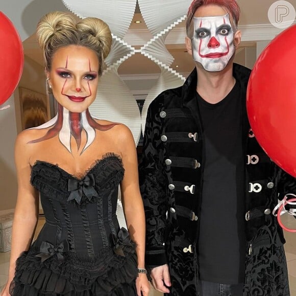 Fantasia do palhaço It para casal no Halloween: o tema foi escolhido pela apresentadora Eliana e o marido, Adriano Ricco