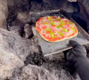Lava de vulcão ativo assa a pizza apesar das temperaturas baixas
