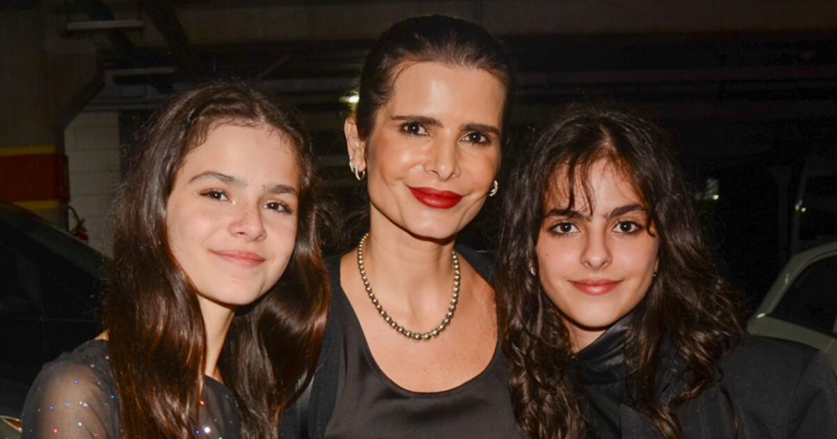 Luciano Camargo’s twin daughters combine an all-black look and attract attention with their beauty, height and resemblance to their mother