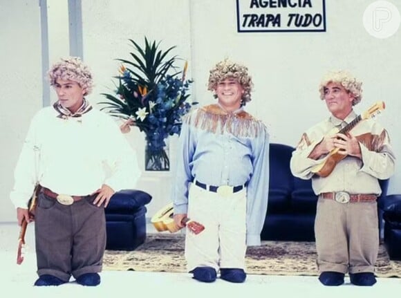 Renato Aragão em foto com Leandro e Leonardo nos anos 1990 em programa da Globo