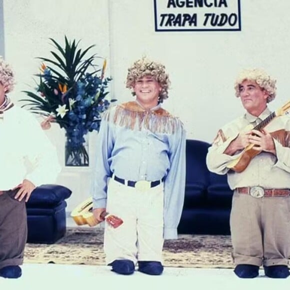 Renato Aragão em foto com Leandro e Leonardo nos anos 1990 em programa da Globo