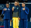 As atletas Simone Biles, Rebeca Andrade e Jordan Chiles com suas medalhas nas Olimpíadas de Paris 2024.