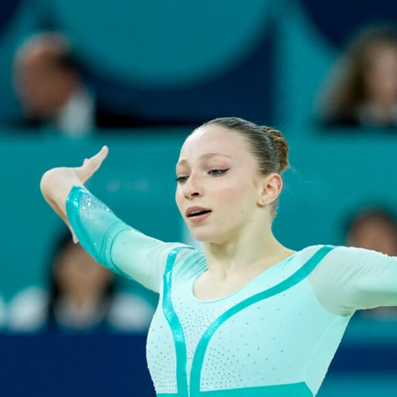 Na ocasião, Ana Barbosu estava em terceiro lugar com 13,700, e acabou perdendo a medalha no último instante quando a nota de Chiles se alterou