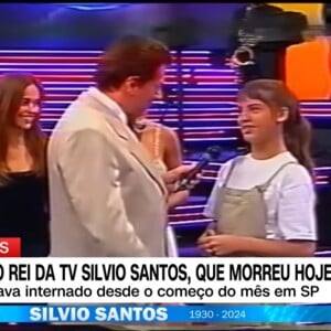 Silvio Santos conversou com Elisa Veeck, na época no elenco da novela 'Chiquititas', durante participação no 'Qual é a Música', em 2000