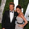 Victoria Beckham posa ao lado do marido, David Beckham