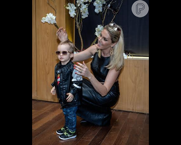 Ana Hickmann e o filho no lançamento da nova coleção de óculos da marca da apresentadora
