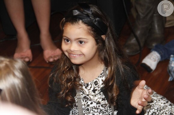 Ivy, filha do ex-jogador Romário, portadora da síndrome de down, participou do lançamento do calendário
