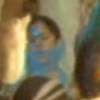Bela Gil em cena do clipe 'Ralando o Tchan' do É o Tchan. A filha de Gilberto Gil aparece ao centro usando um véu azul