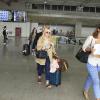 Dakota Fanning desembarca no aeroporto internacional do Rio de Janeiro, em 27 de setembro de 2013