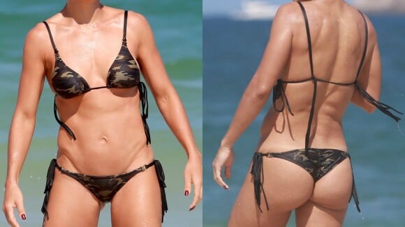 Juliana Paes exibe barriga seca de biquíni em dia de praia com a família
