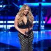 Mariah Carey mostra barriguinha avantajada em evento nos EUA