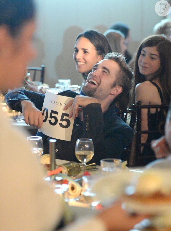 O ator Robert Pattinson no Go Go Gala, leilão beneficente para arrecadar fundos para crianças órfãs em todo o mundo, em Los Angeles, Estados Unidos, na última quinta-feira, 14 de novembro de 2013