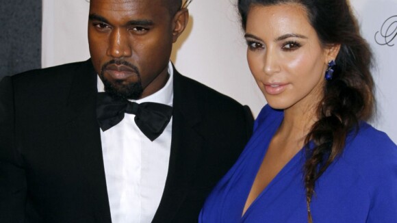 Bebê a bordo: Kim Kardashian fecha 2012 grávida. Kanye West anunciou em um show
