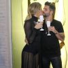 Giovanna Ewbank troca beijos com o marido, Bruno Gagliasso, em evento de marca de lingeries no Rio