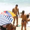 Caio Castro e Felipe Titto curtem praia do Rio, em 14 de Janeiro de 2014
