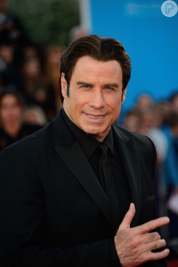 John Travolta diz que gostaria de atuar no próximo '007' (12 de fevereiro de 2014)