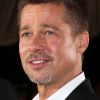 Brad Pitt foi flagrado aos beijos com a atriz Sienna Miller durante festival de música