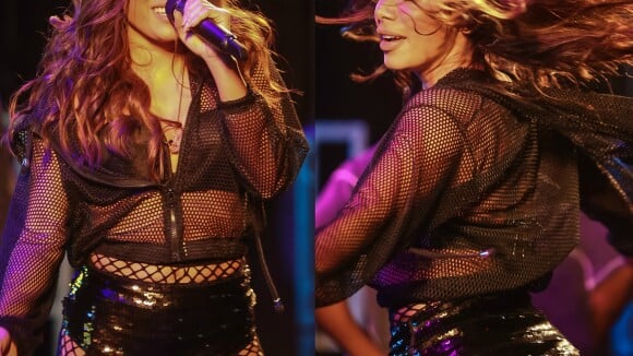 Anitta exibe curvas com look transparente e meia arrastão durante show em SP
