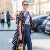 Seguindo o estilo casual fashion, Helena Bordon vestiu body Lenny Niemeyer, jeans Re/Done, capa Etro, bota Balenciaga e bolsa Gucci para ver o desfile de Ulyana Sergeenko em Paris no dia 4 de julho de 2017