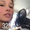 Sasha Meneghel usou o ventilador portátil de um táxi para fugir do calor de Nova York, nesta sexta-feira, 21 de julho de 2017